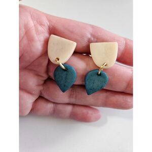 Gold tone cream and blue earrings